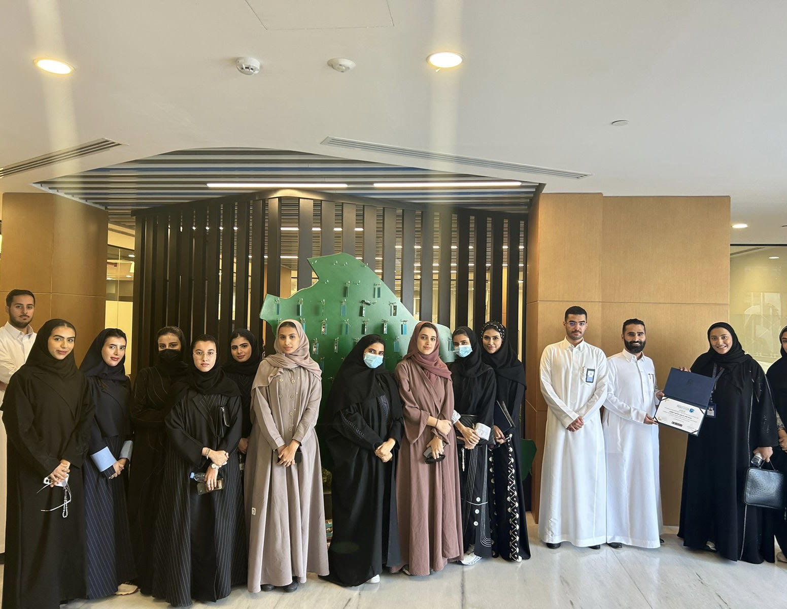 A group of male and female students from the College of Law at Prince Sultan University visiting the headquarters of Al Rajhi Takaful